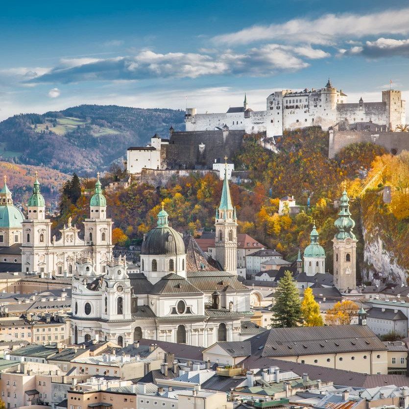 Aerial view of the historic city of Salzburg with Hohensalzburg Fortress in beautiful evening light in fall, Salzburger Land, Austria (Aerial view of the historic city of Salzburg with Hohensalzburg Fortress in beautiful evening light in fall, Salzbur